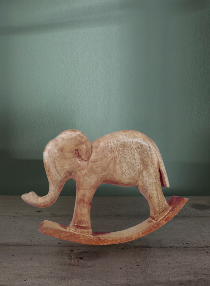 Elefante decorativo a dondolo. Legno colore naturale. 30x21x5cm.